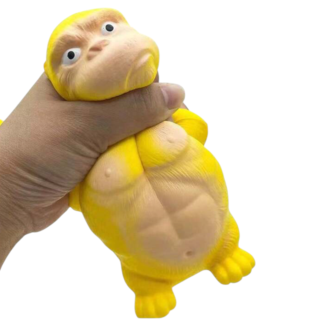 Yellow gorilla squeeze stress toy - hand squeeze close-up